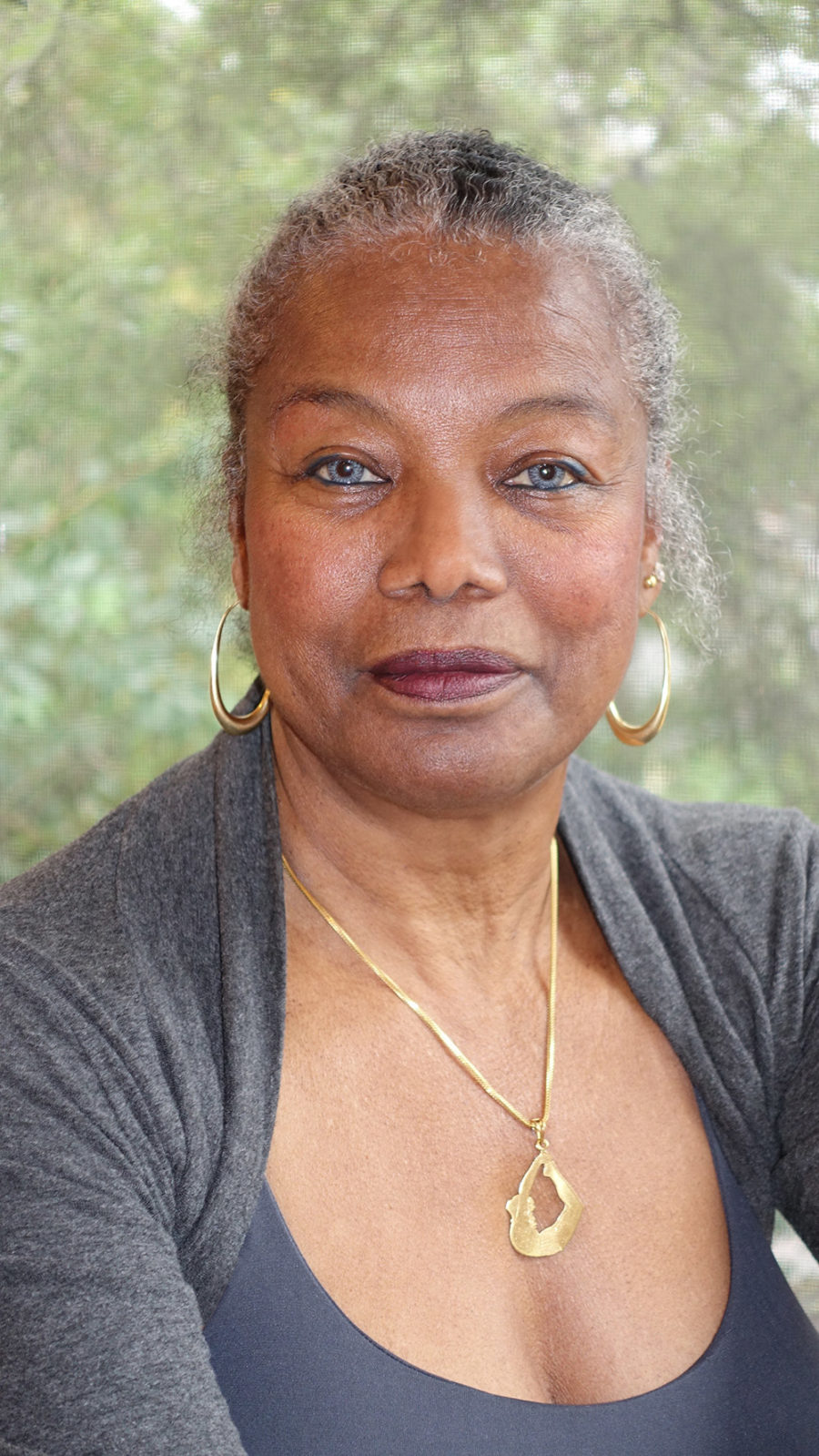 Photo of Jaki Nett, straight on view, not smiling, in color